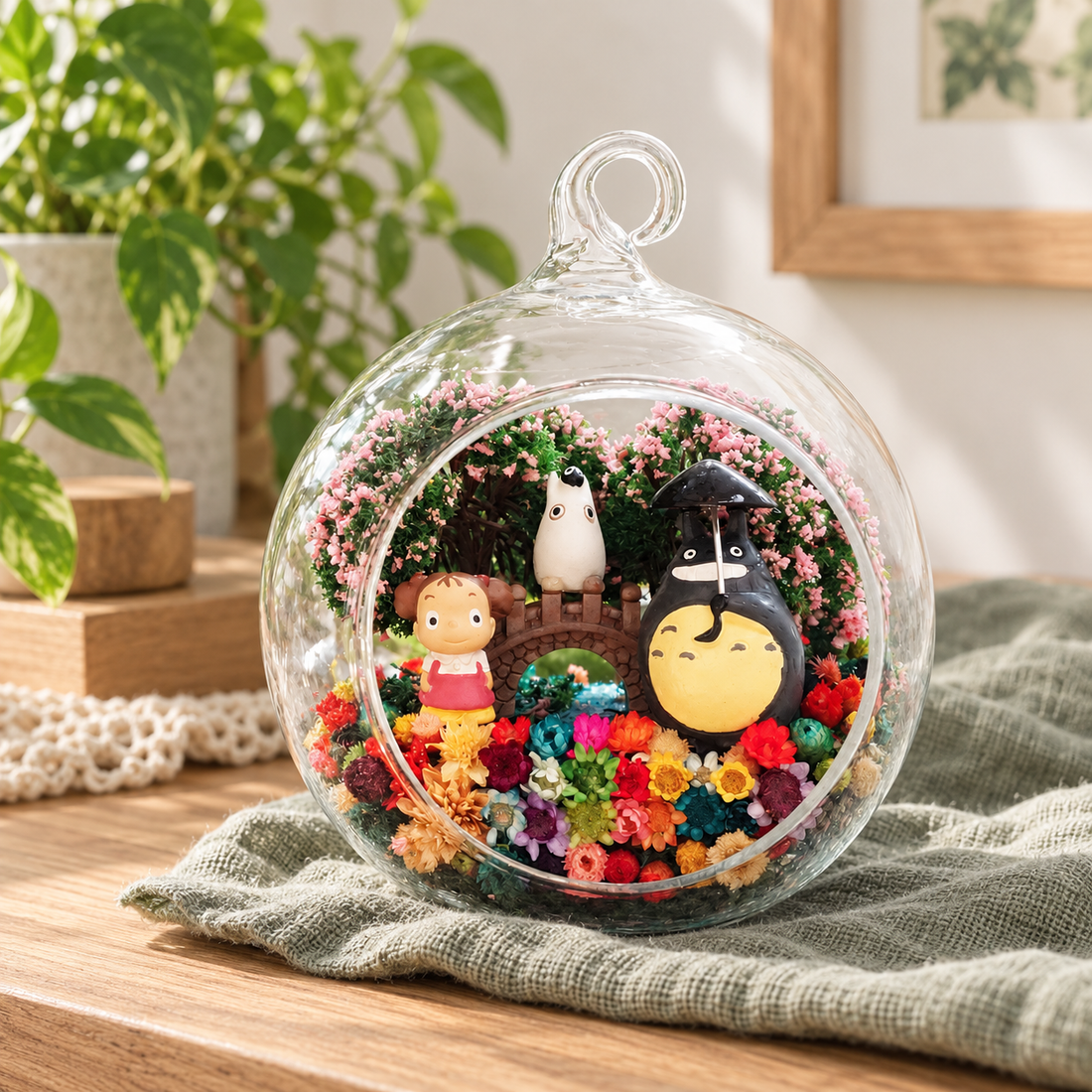 Grey Figure with Little Friends Terrarium styled in a natural home setting with clear glass and product details