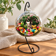 Relaxed Bear Preserved Flower Terrarium styled in a natural home setting with clear glass and product details