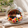 White Puppy with Bridge Preserved Flower Terrarium styled in a natural home setting with clear glass and product details
