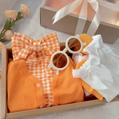 Orange Buttercup classic baby gift box with orange romper and cardigan