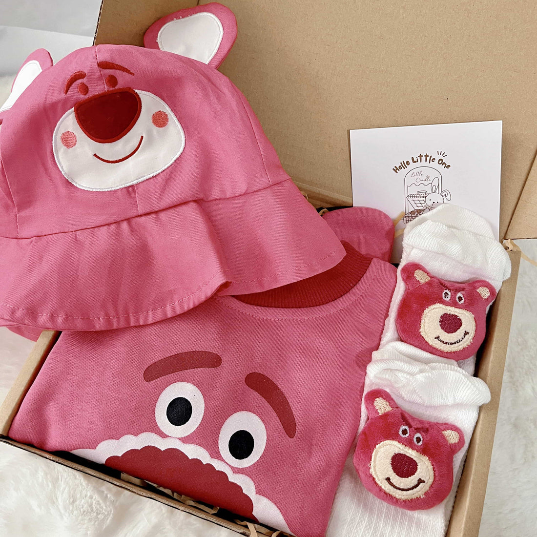 Pink Pals Lotso standard baby gift box with pink bear-themed romper
