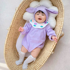 Baby wearing the Purple Bunny romper with purple bunny-ear hat