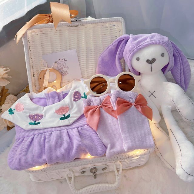 Purple Bunny premium baby gift set in a rattan basket with romper with purple bunny-ear hat