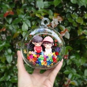 Sitting Couple with Heart preserved flower terrarium