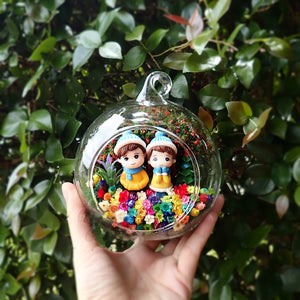 Snowy Couple in Yellow preserved flower terrarium