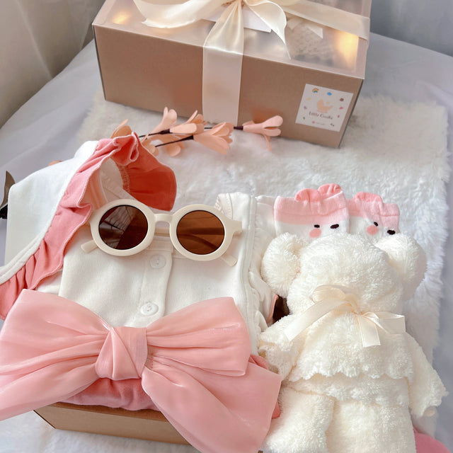 Strawberry Mochi classic baby gift box with pink romper with ribbon accent