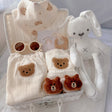 Summer Bear premium baby gift set in a rattan basket with bear-themed summer romper