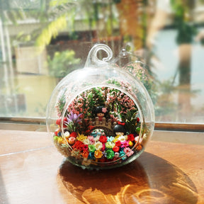 Two Little Dolls on Bridge preserved flower terrarium