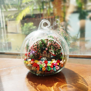 Two Little Dolls on Bridge preserved flower terrarium